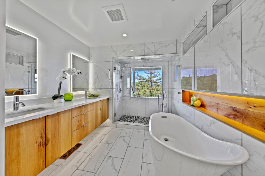 337 Clorinda  white washed bathroom with wood cabinets